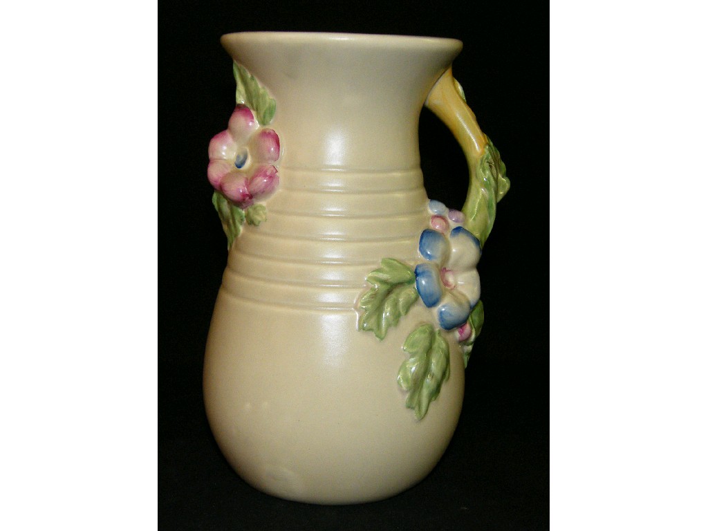 Appraisal: Clarice Cliff floral relief moulded jug decorated with flowers in