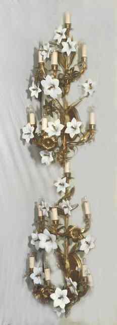 Appraisal: A PAIR OF FRENCH BRASS WALL LIGHTS of floral and