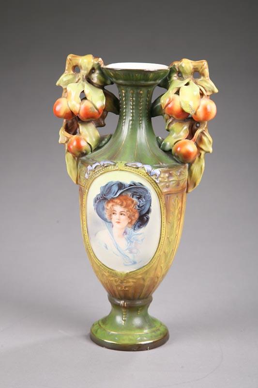 Appraisal: PORTRAIT VASE Teplitz with leaf and berry handles gilt accents