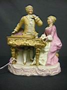 Appraisal: GERMAN BISQUE DOUBLE NODDER FIGURINE Vintage unmarked German Bisque nodder