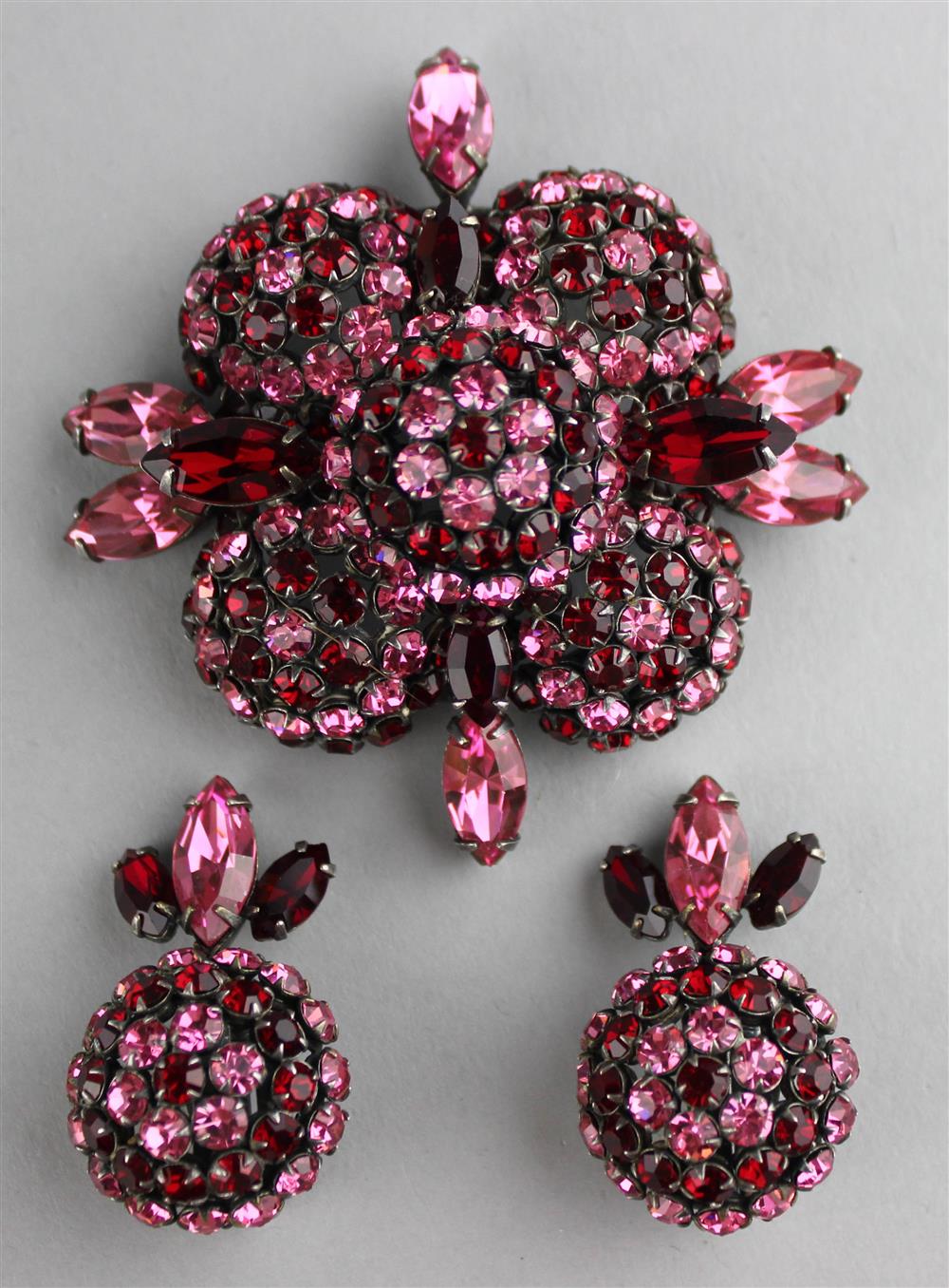 Appraisal: SCHREINER PINK AND RED RHINESTONE PIN AND MATCHING EARRINGS pin