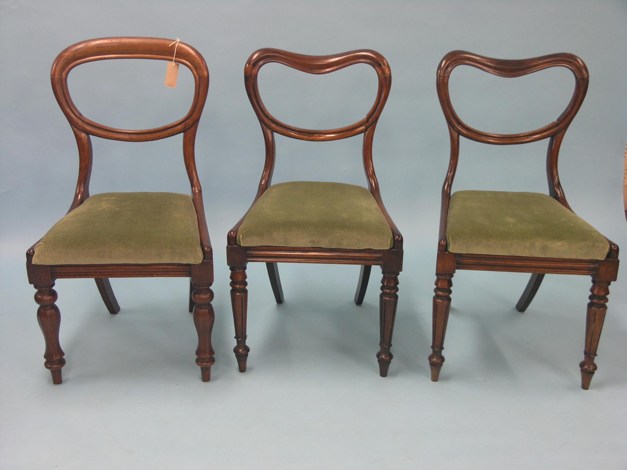 Appraisal: A pair of Victorian rosewood balloon-back dining chairs and another