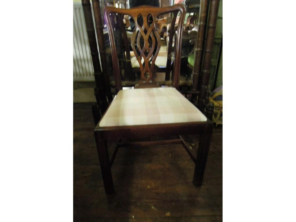 Appraisal: A set of six reproduction Chippendale style mahogany dining chairs