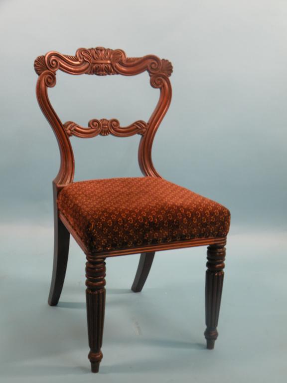 Appraisal: A William IV carved rosewood side chair with a padded