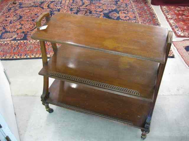 Appraisal: Mahogany Butlers Trolley three shelf brass gallery trim '' tall