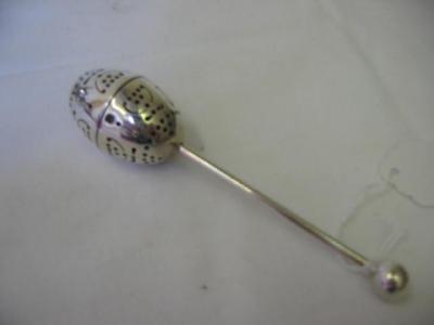 Appraisal: A CONTINENTAL TEA INFUSER of hinged and pierced ovoid form