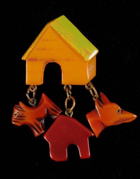 Appraisal: Bakelite Doghouse Pin Description Rare Condition Excellent Size T