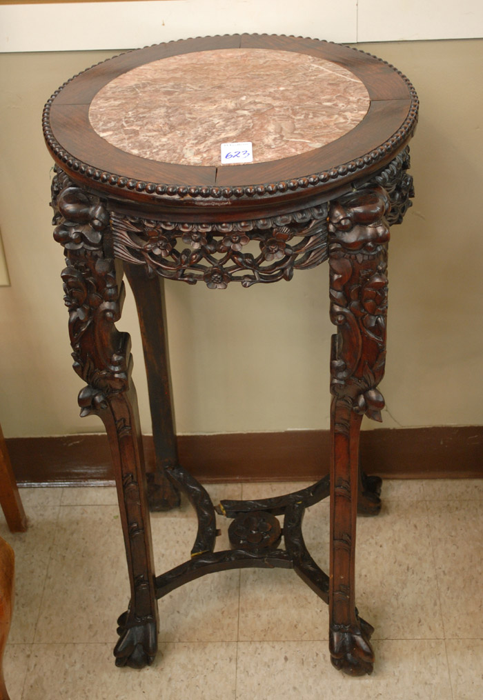 Appraisal: CARVED HONGMU PEDESTAL TABLE Chinese export early th century having