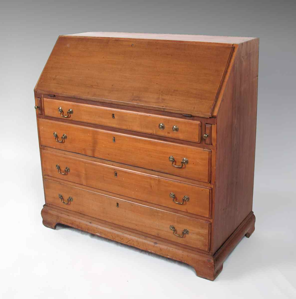 Appraisal: TH C MAPLE DROP FRONT SECRETARY DESK Four full length