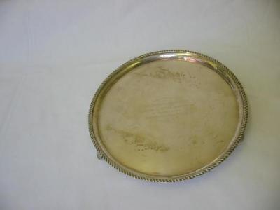 Appraisal: A WAITER of circular form the moulded rim with rope