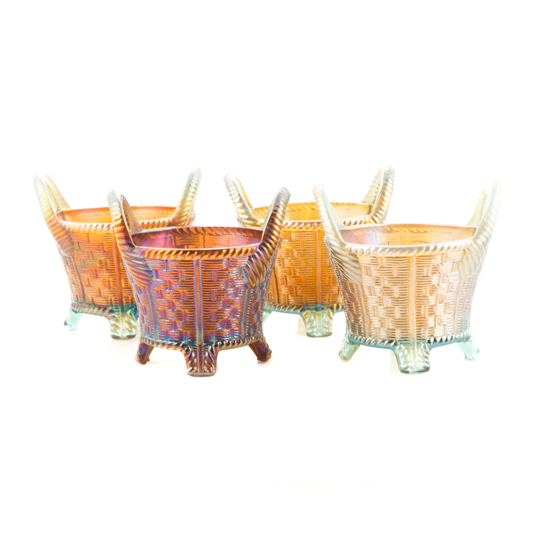 Appraisal: Four Northwood iridescent glass baskets first quarter- th century each