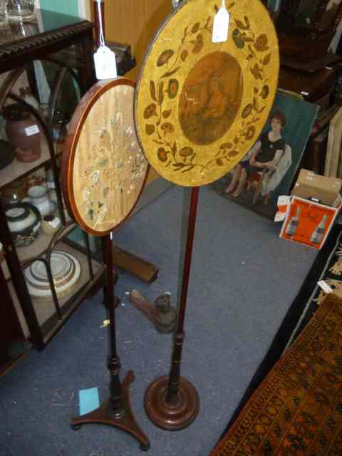 Appraisal: A REGENCY MAHOGANY POLE SCREEN with oval needlework adjustable screen