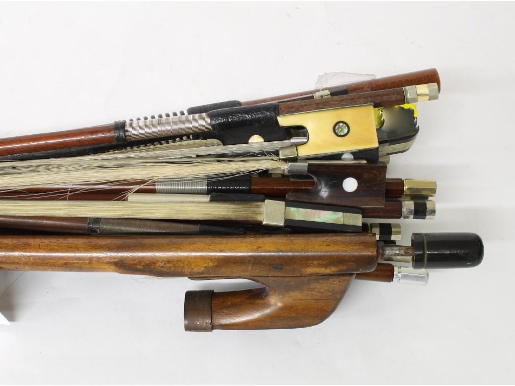 Appraisal: Small bundle of various bows including two double bass bows