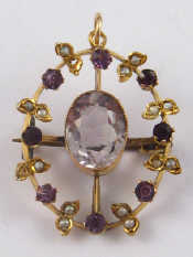 Appraisal: A yellow metal tests carat gold amethyst pendant with brooch