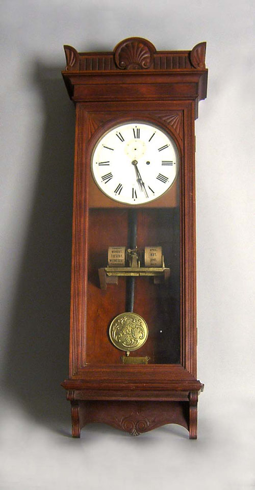 Appraisal: Mahogany calendar clock h