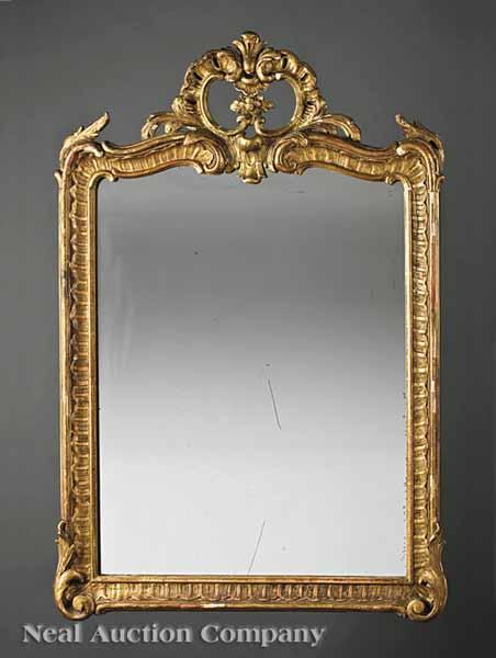 Appraisal: A Napoleon III Giltwood Mirror in the Louis XV Taste