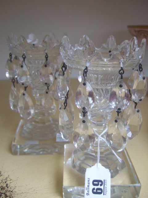 Appraisal: A pair of Victorian cut glass lustres hung with glass