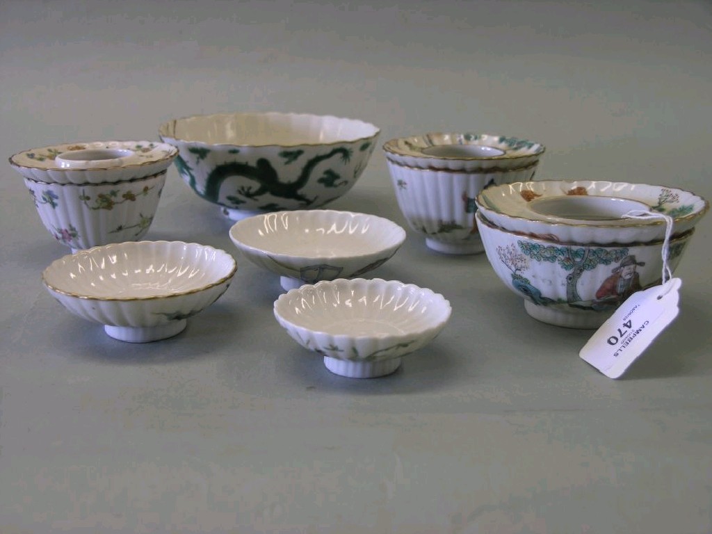 Appraisal: Three th century Chinese porcelain tea bowls each with cover