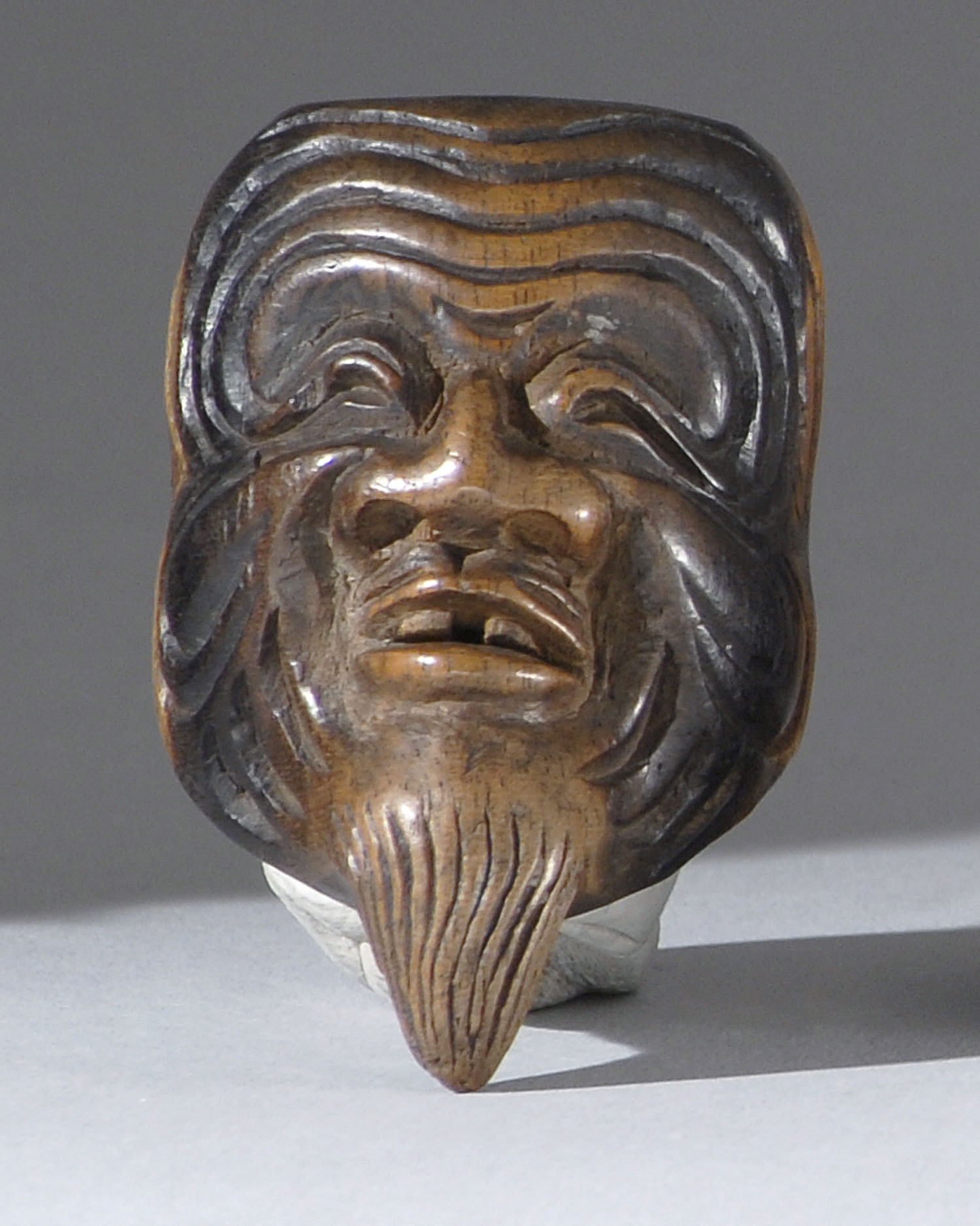 Appraisal: WOOD MASK NETSUKE th CenturyBy Kanemori Depicting an elderly bearded