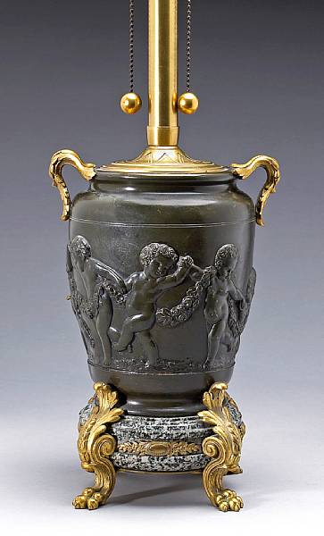 Appraisal: A French Neoclassical style patinated and gilt bronze urn on