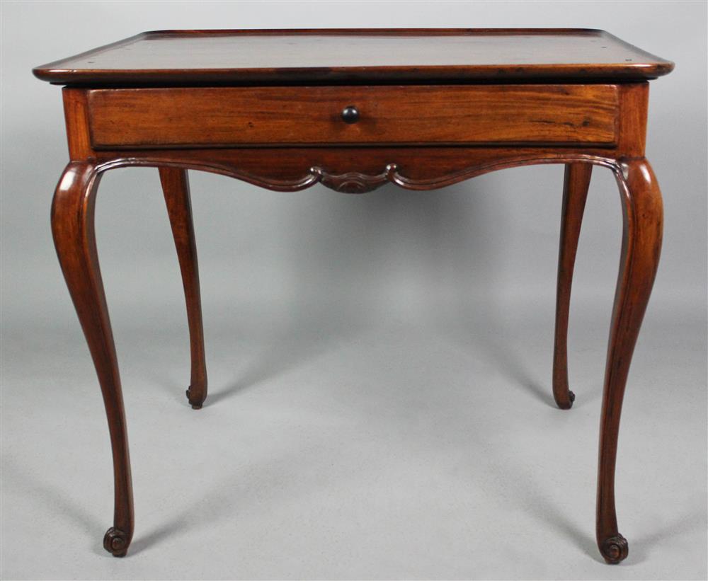 Appraisal: CONTINENTAL ROCOCO MAHOGANY SIDE TABLE fitted with a frieze drawer