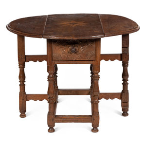 Appraisal: A Marquetry Inlaid Drop Leaf Table Continental th Century with