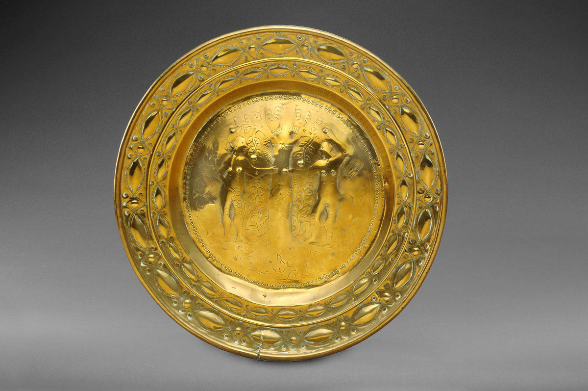 Appraisal: CONTINENTAL BRASS ALMS DISH SEVENTEENTH CENTURY Repousse with a view