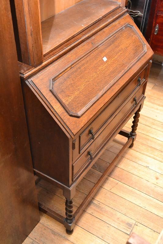 Appraisal: A JACOBEAN OAK SECRETAIRE JACOBEAN OAK SECRETAIRE