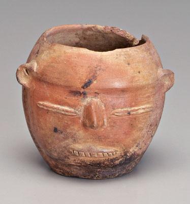 Appraisal: Nayarit earthenware effigy vessel rounded form with slit eyes and