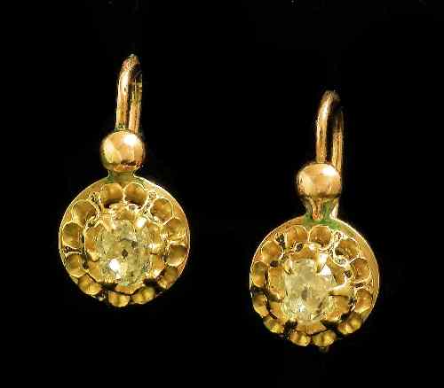 Appraisal: A pair of late Victorian gold coloured metal diamond set