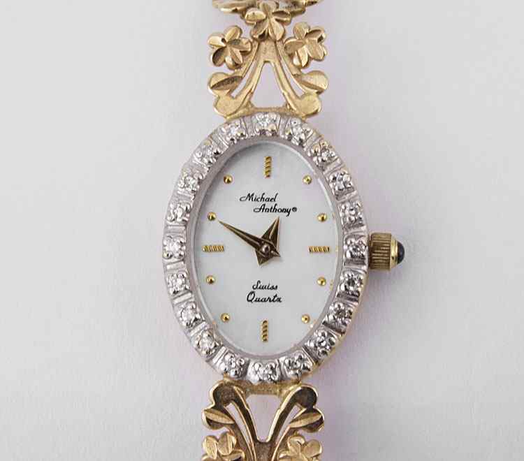 Appraisal: K GOLD AND DIAMOND MICHAEL ANTHONY LADIES WRISTWATCH Ca K