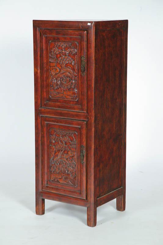 Appraisal: CABINET Asian th century hardwood Tall cabinet with two carved