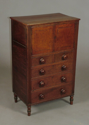 Appraisal: A small Regency mahogany chest of drawers the top above