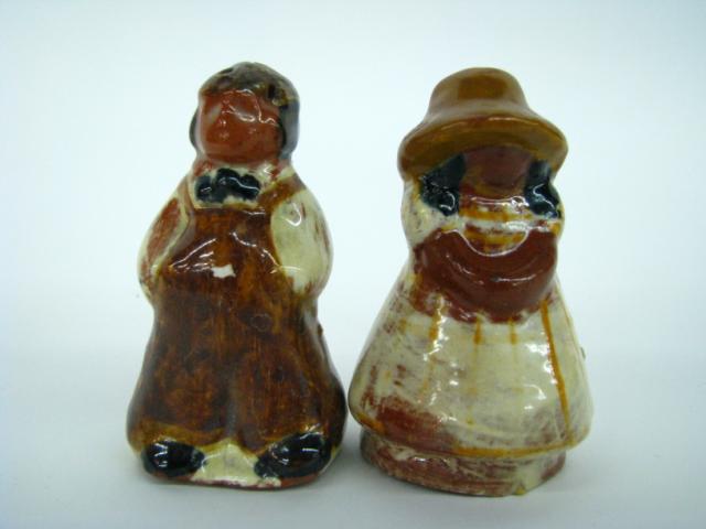 Appraisal: Pair of Brown County Pottery figural salt and pepper shakers