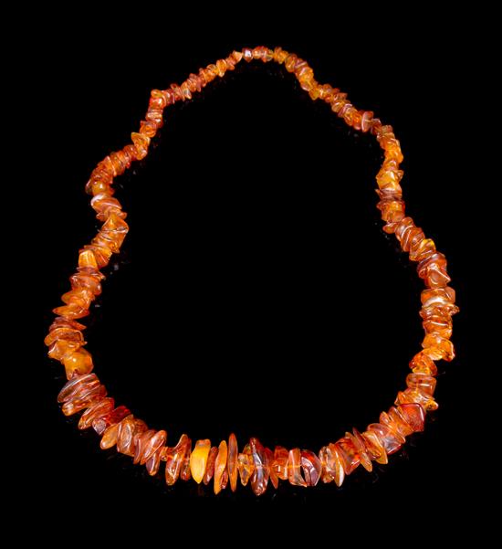 Appraisal: Sale Lot An Amber Beaded Necklace comprising various amber beads