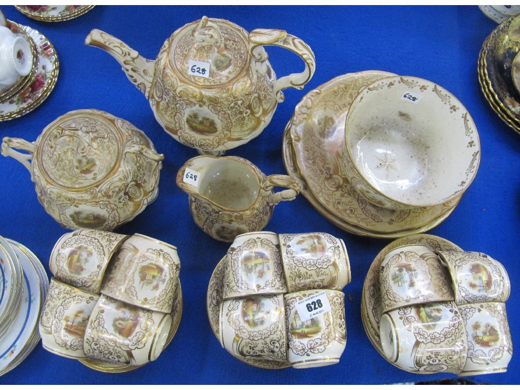 Appraisal: Victorian cream white and gilt teaset with painted landscape panels