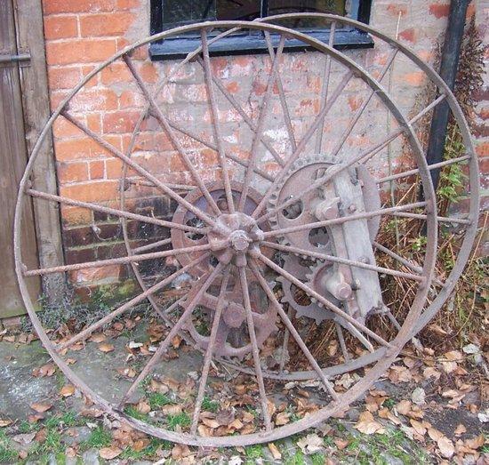 Appraisal: Two metal wheels with gearing by Knapp and Co Ltd