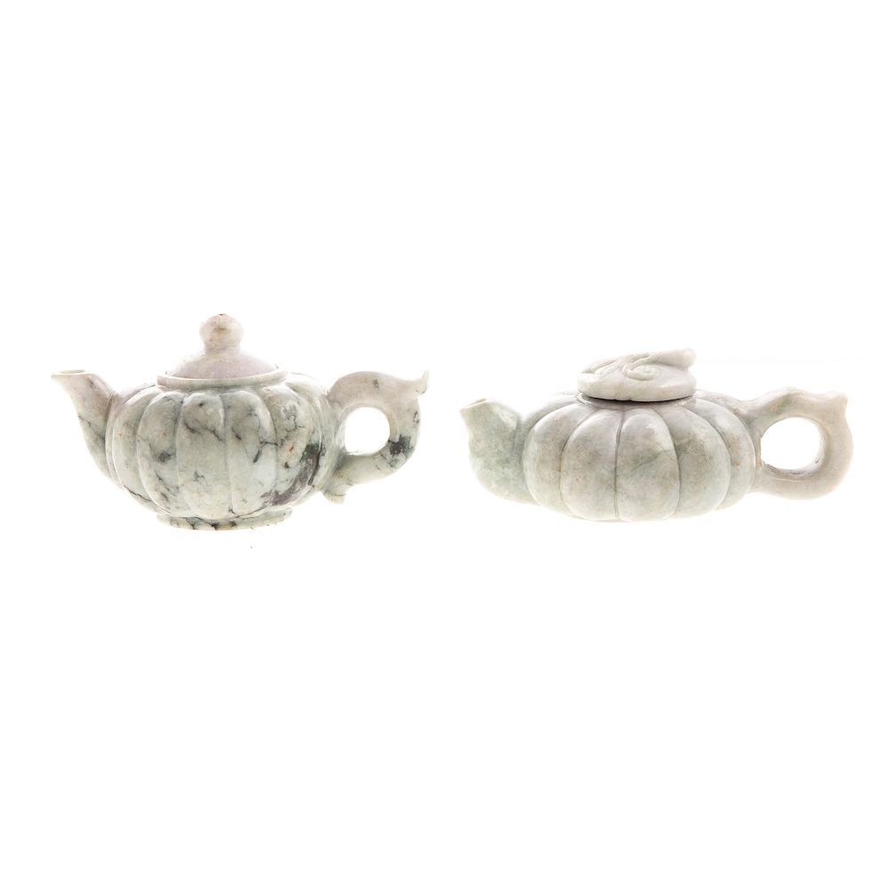 Appraisal: Two Chinese Carved Green and Lavender Jade Teapots melon form