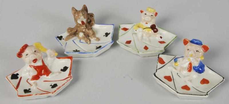 Appraisal: Set of Three Little Pigs Wolf Card Suit Trays Description