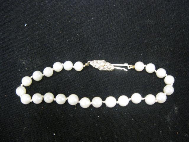 Appraisal: Pearl Bracelet pearls to mm k gold clasp long