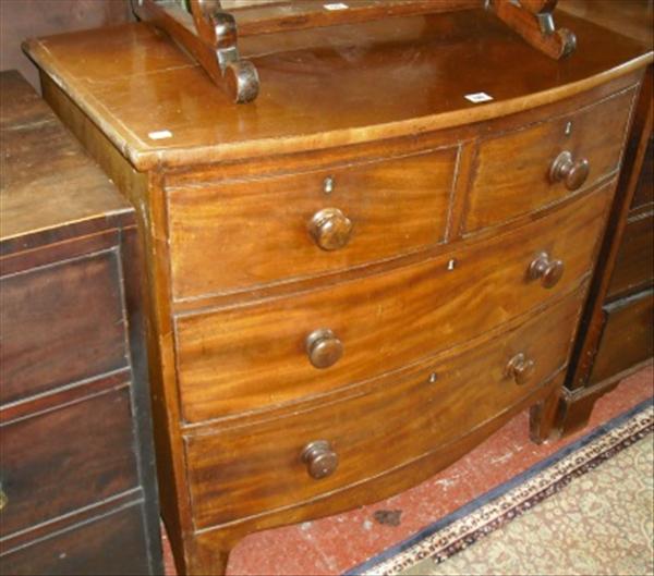 Appraisal: A Victorian bow front chest of two short and tw