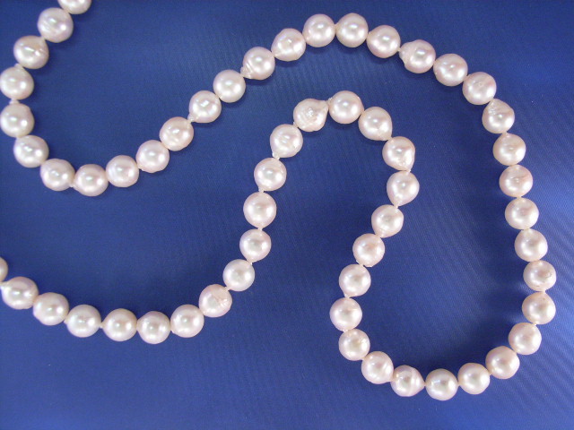 Appraisal: A - mm Akoya semi baroque pearl necklace with a