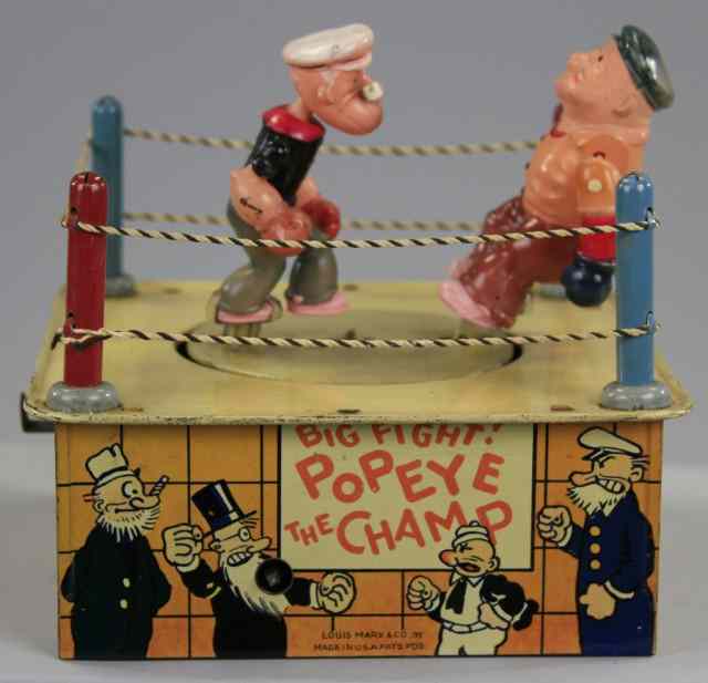 Appraisal: POPEYE THE CHAMP Louis Marx lithographed tin boxing ring complete