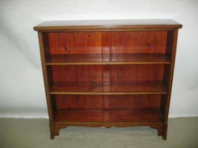 Appraisal: AN EDWARDIAN MAHOGANY OPEN BOOKCASE of oblong form with satinwood