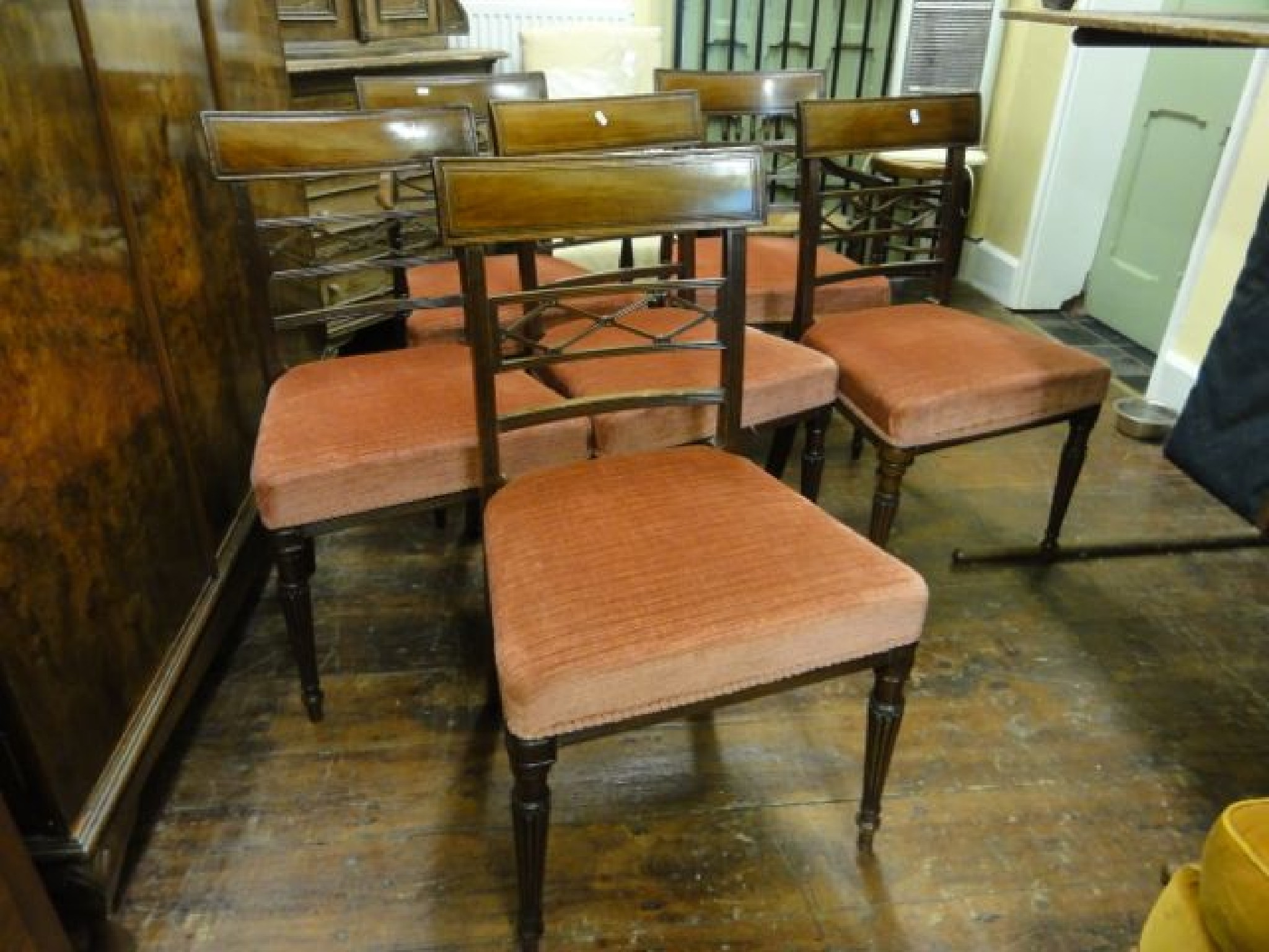 Appraisal: A set of six Georgian mahogany dining chairs with lattice