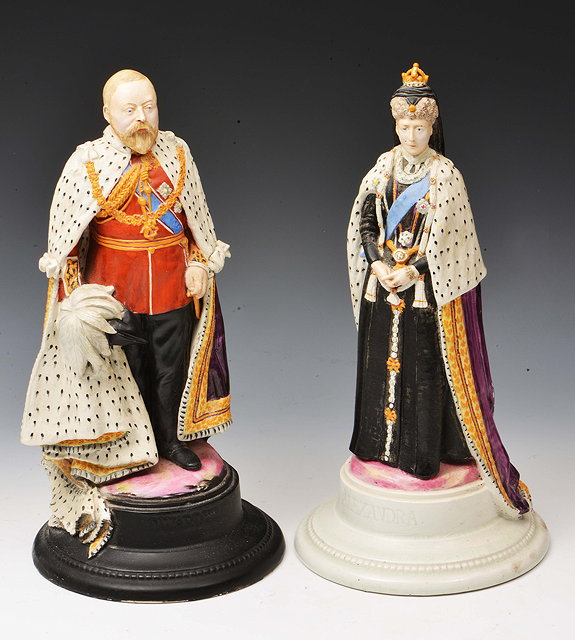 Appraisal: A PAIR OF POTTERY SCULPTURES one depicting King Edward VII