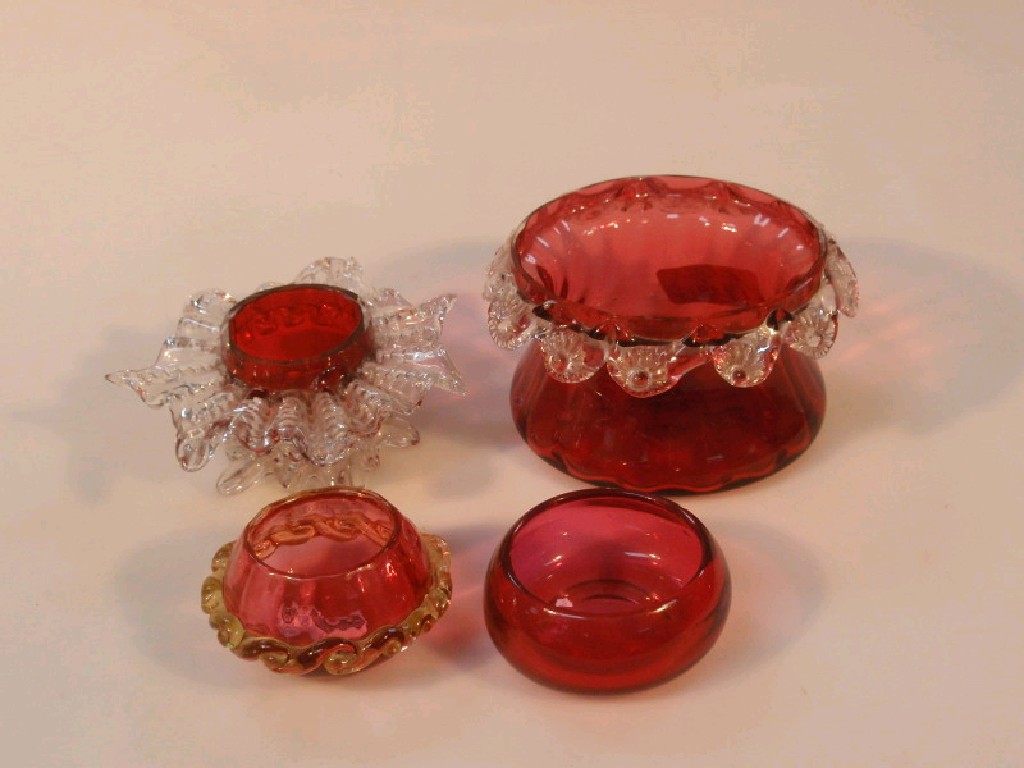 Appraisal: A cranberry glass sugar bowl with applied clear glass prunts