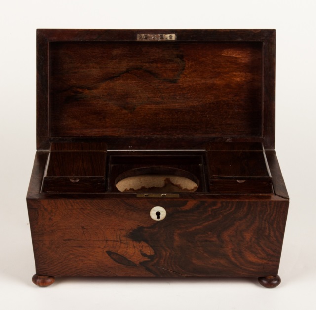 Appraisal: Regency rosewood tea caddy circa sarcophagus form with bun feet