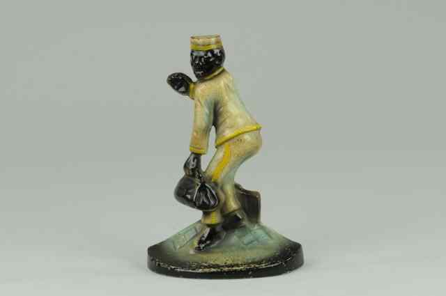 Appraisal: BELLHOP DOORSTOP Creation Co classic image of bellhop in humorous