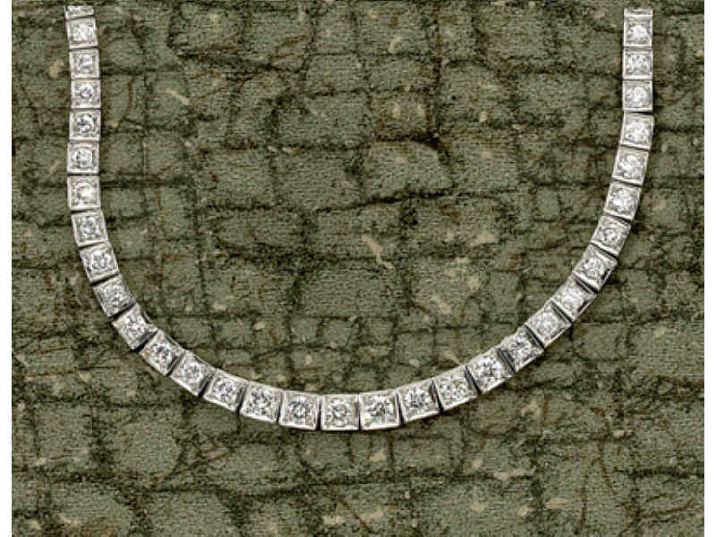 Appraisal: DIAMOND RIVIERE Platinum necklace set with eighty-nine round brilliant cut